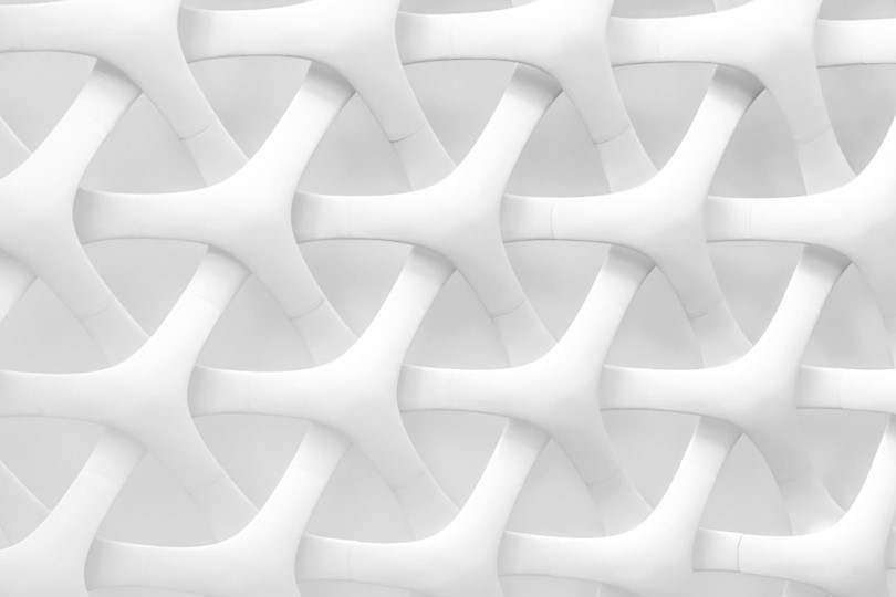 Abstract representation of interconectivity through a black-and-white pattern.